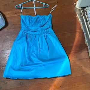 A strapless light blue cocktail dress from David’s bridal